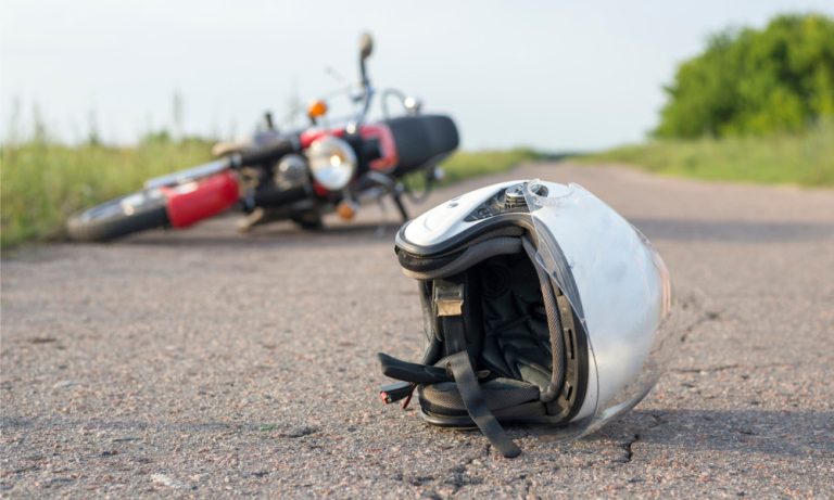 Motorcycle Accident Fatality Data: Helmet Law Compliance and Outcome Analysis